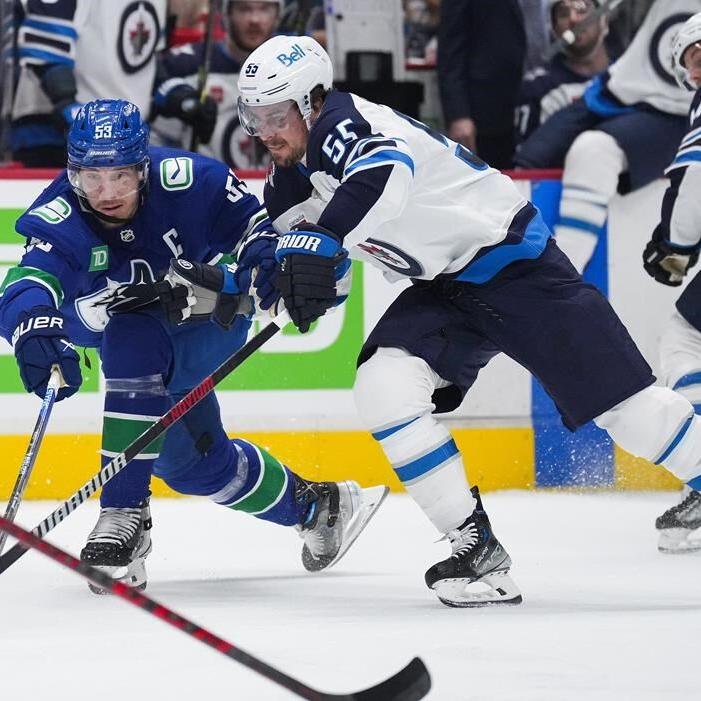 Connor extends streak, Winnipeg Jets hand Vancouver Canucks lopsided loss